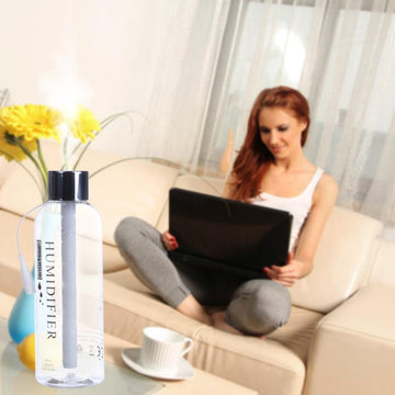atomizing humidifiers discharge ____ into the air.	